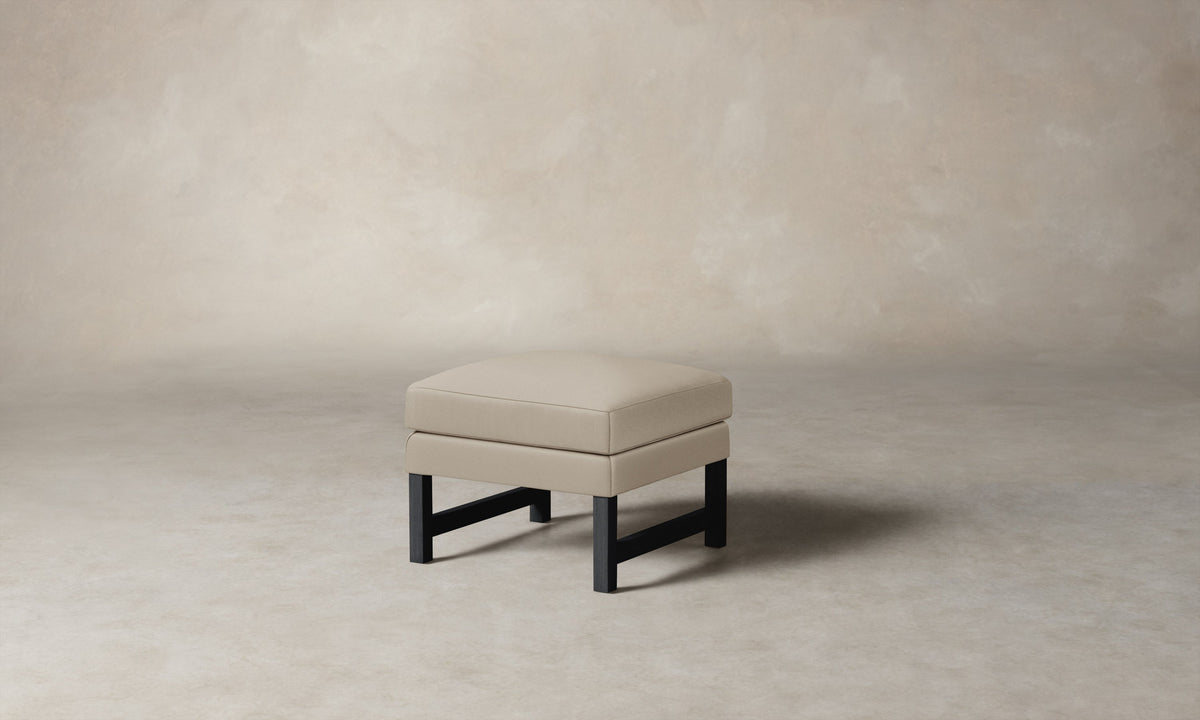 The Kaye Ottoman - Pebbled Leather Stone