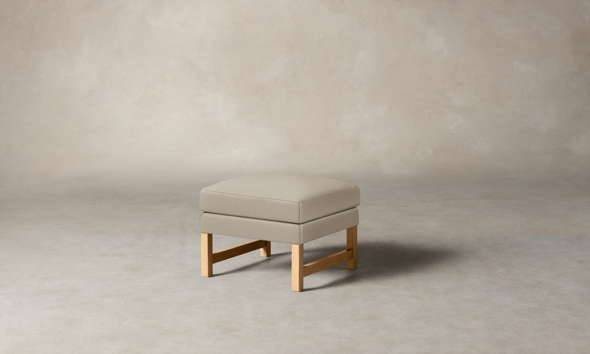 The Kaye Ottoman - Pebbled Leather Stone