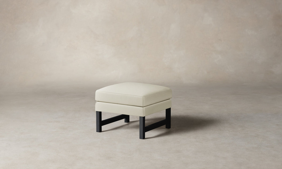 The Kaye Ottoman - Pebbled Leather Swan