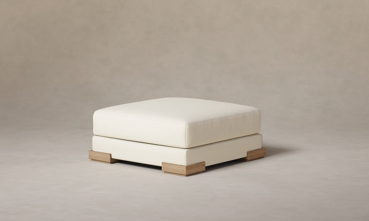 The Blair Ottoman - Pebbled Leather Swan