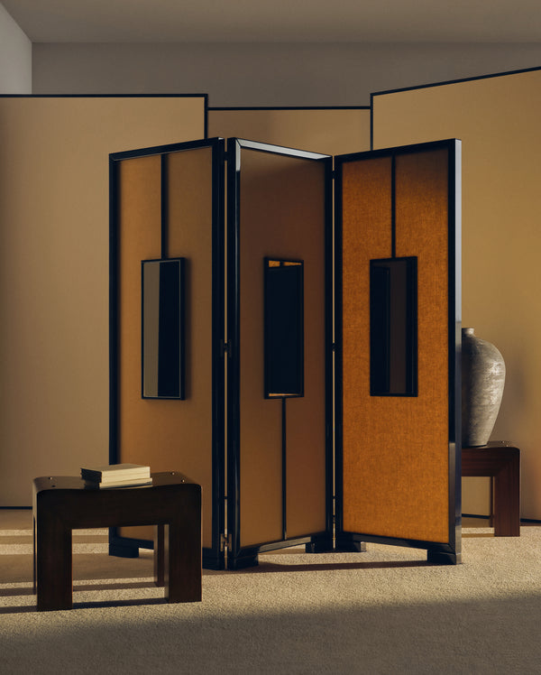 The Lume folding screen in black lacquer with Citron Belgian Linen upholstery panels and mirror insets, from The Collectibles Series, paired with the Lu Bench.