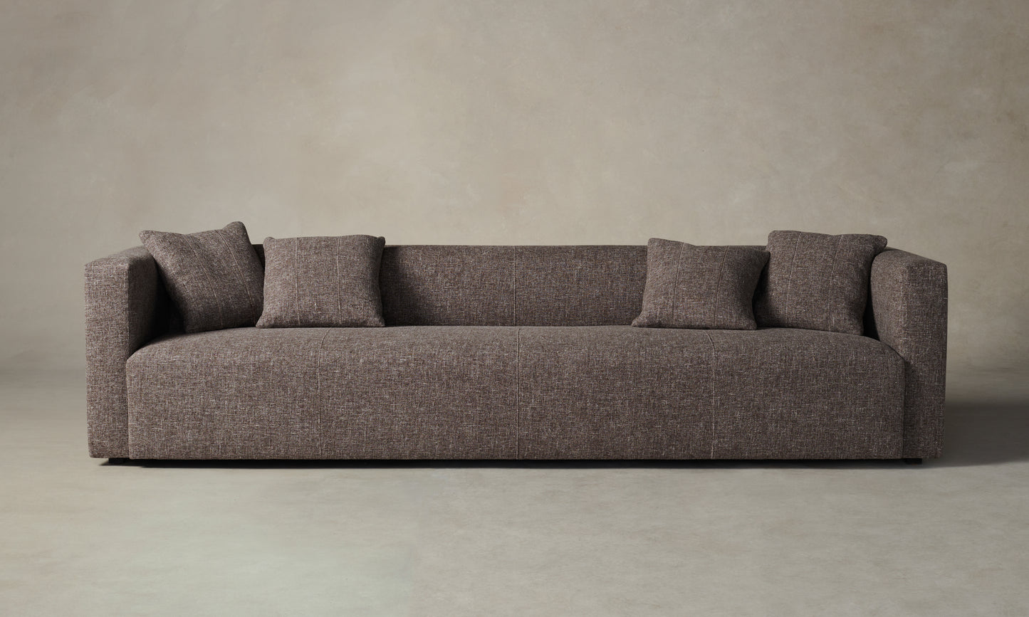 chunky sofa in brown linen with throw pillows - breuer sofa