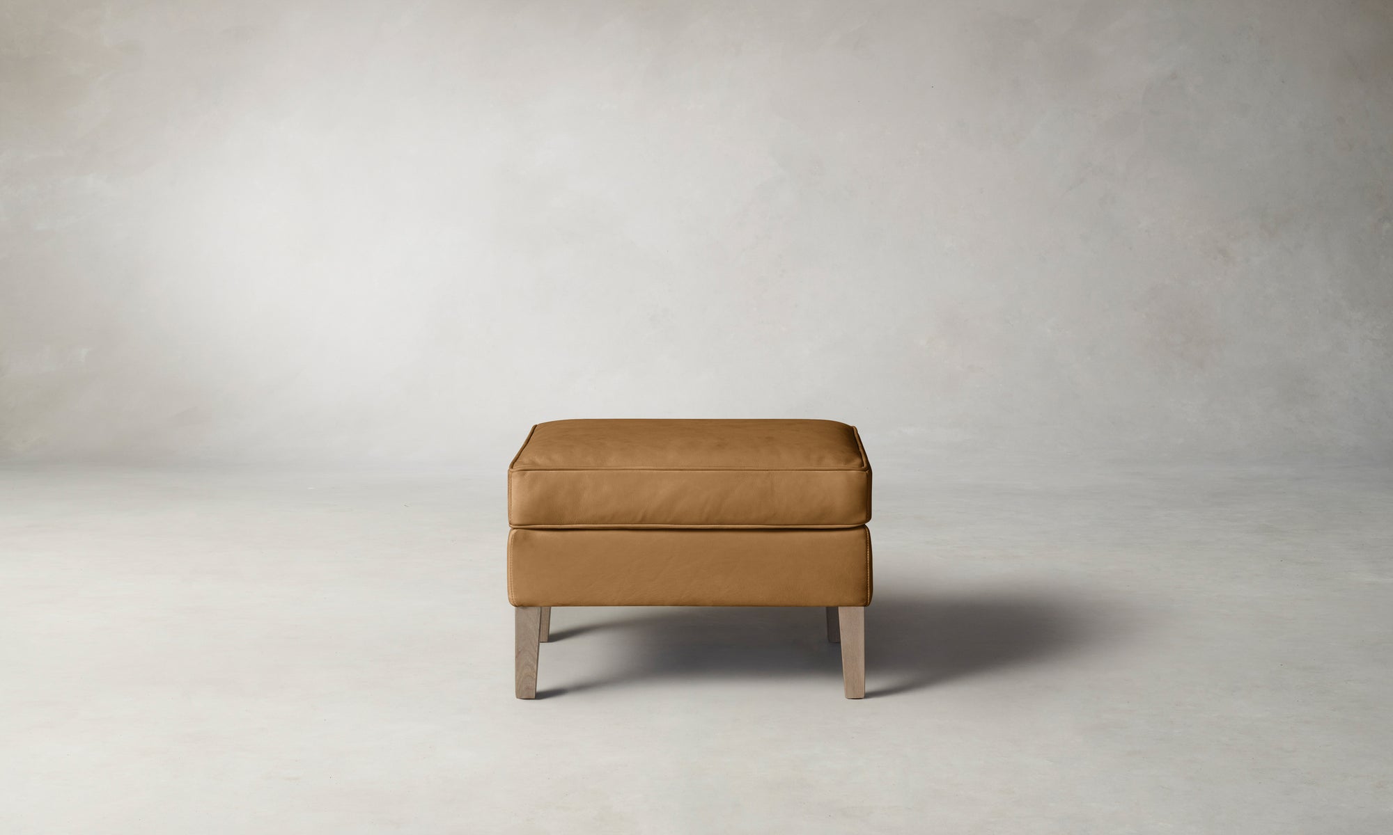 The Chrystie Ottoman - Nubuck Leather Saddle