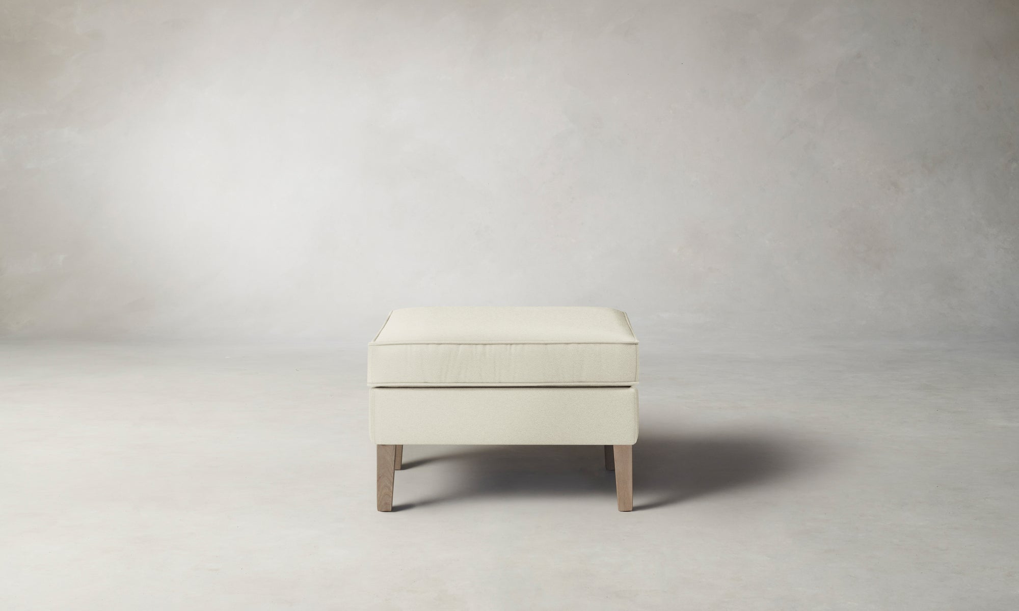 The Chrystie Ottoman - Pebbled Leather Swan