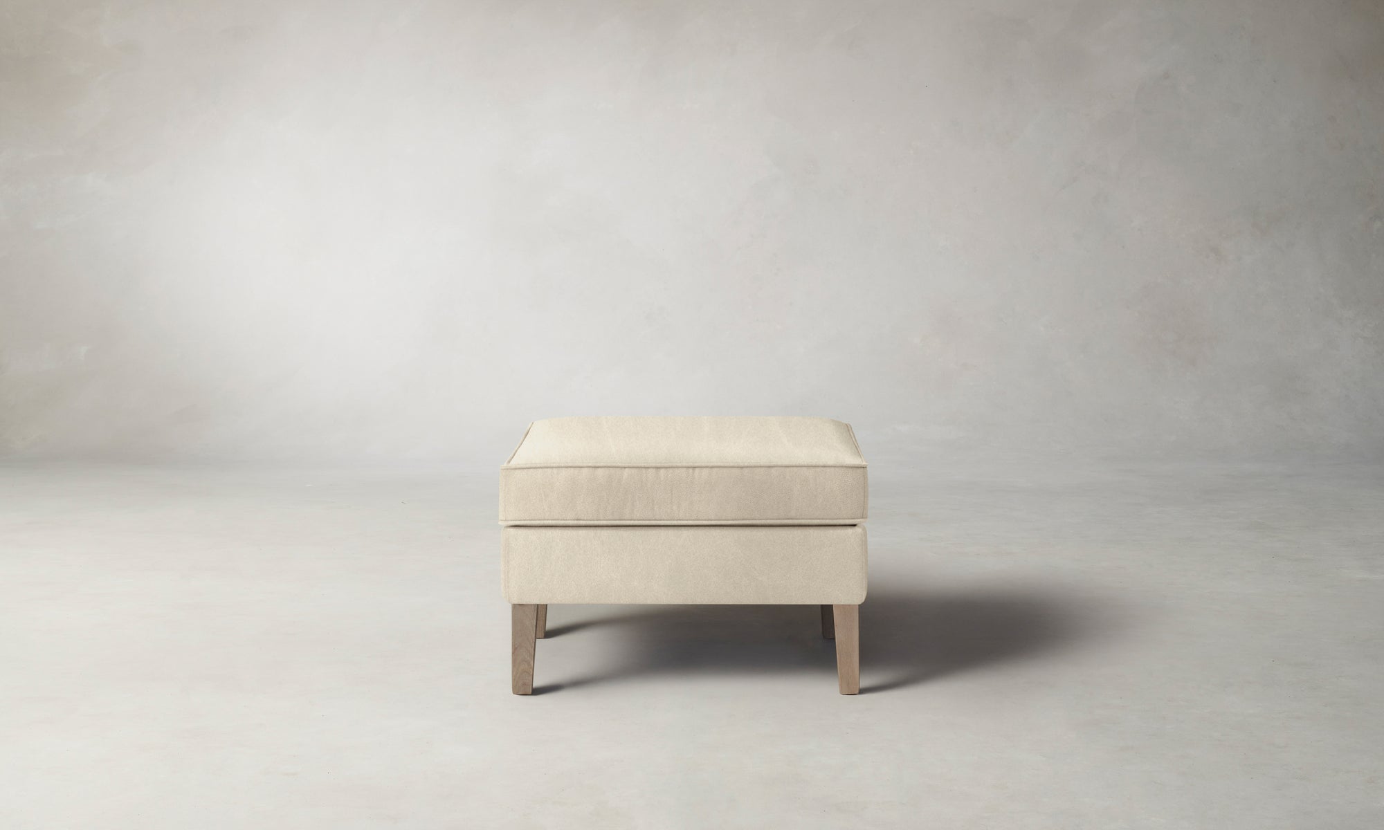 The Chrystie Ottoman - Tuscan Leather Bisque