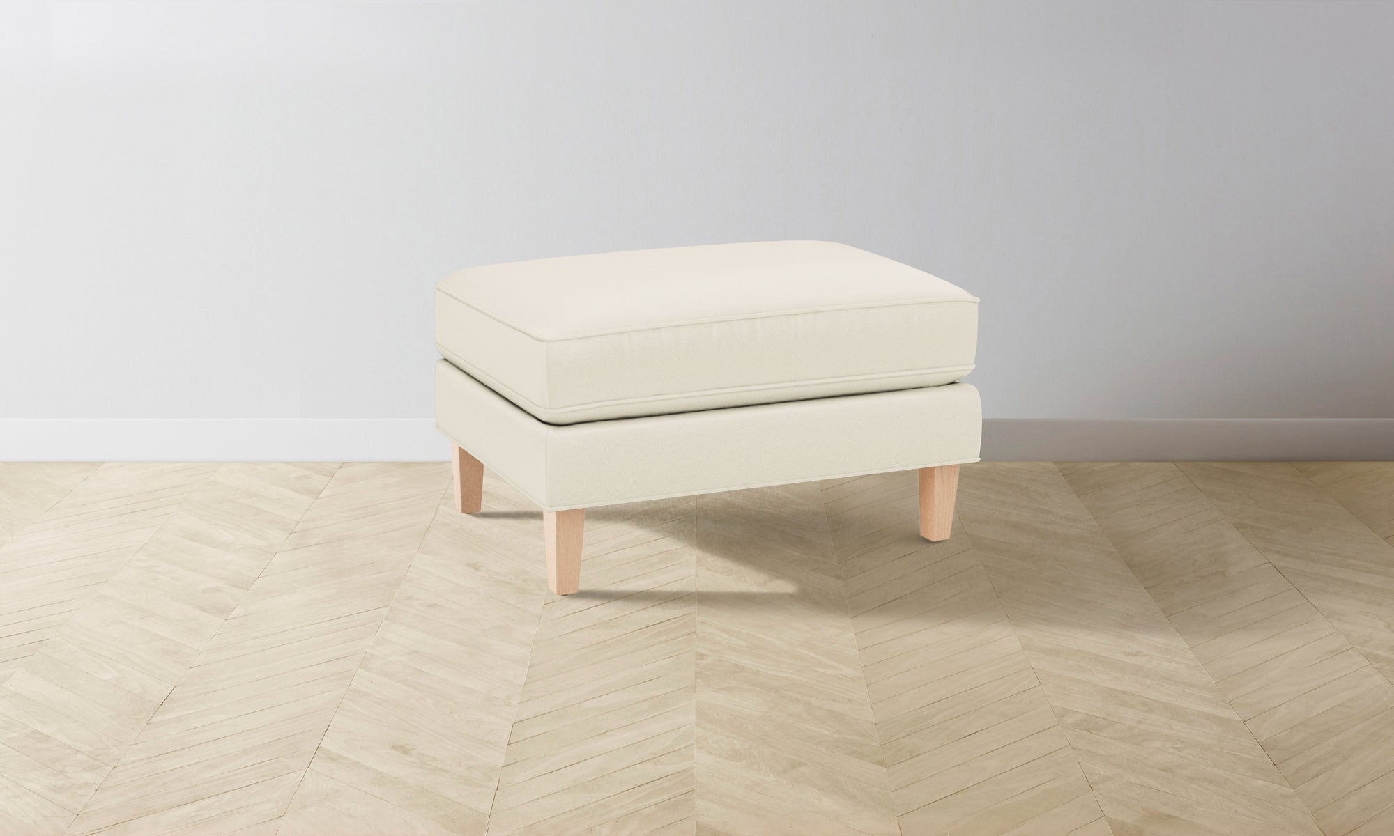 The Crosby Ottoman - Pebbled Leather Swan