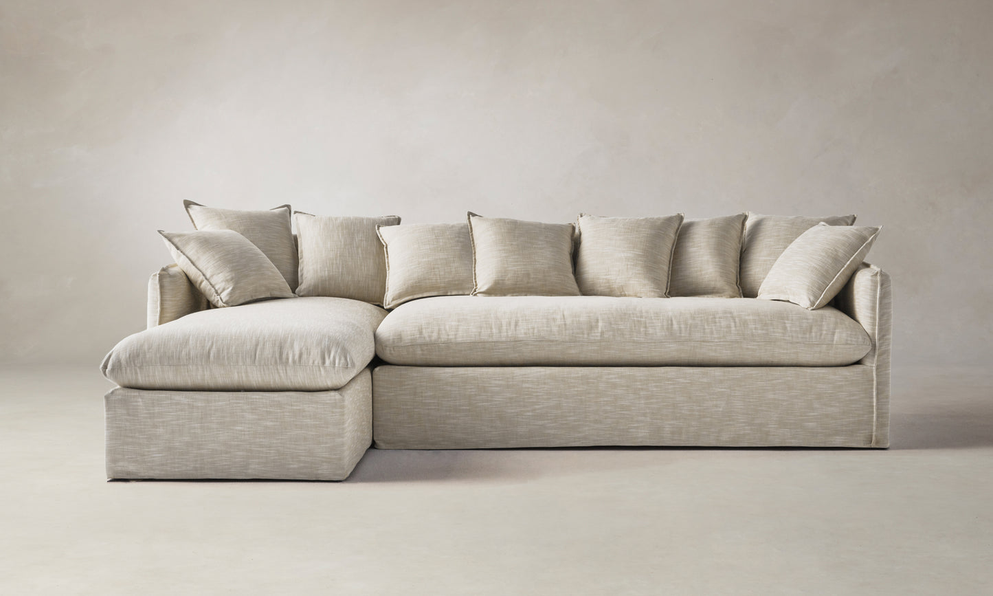 chaise sectional in beige linen with back cushions - dune sectional