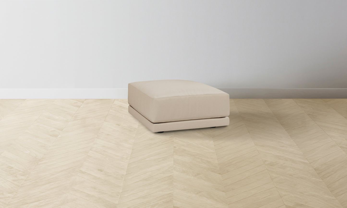 The Jones Ottoman - Pebbled Leather Stone