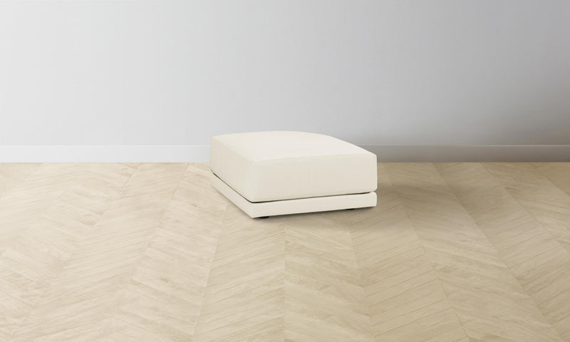 The Jones Ottoman - Pebbled Leather Swan