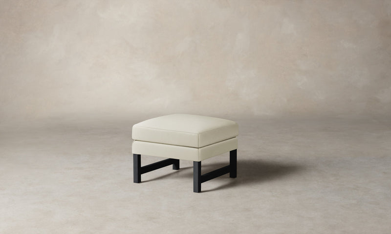 The Kaye Ottoman - Pebbled Leather Swan