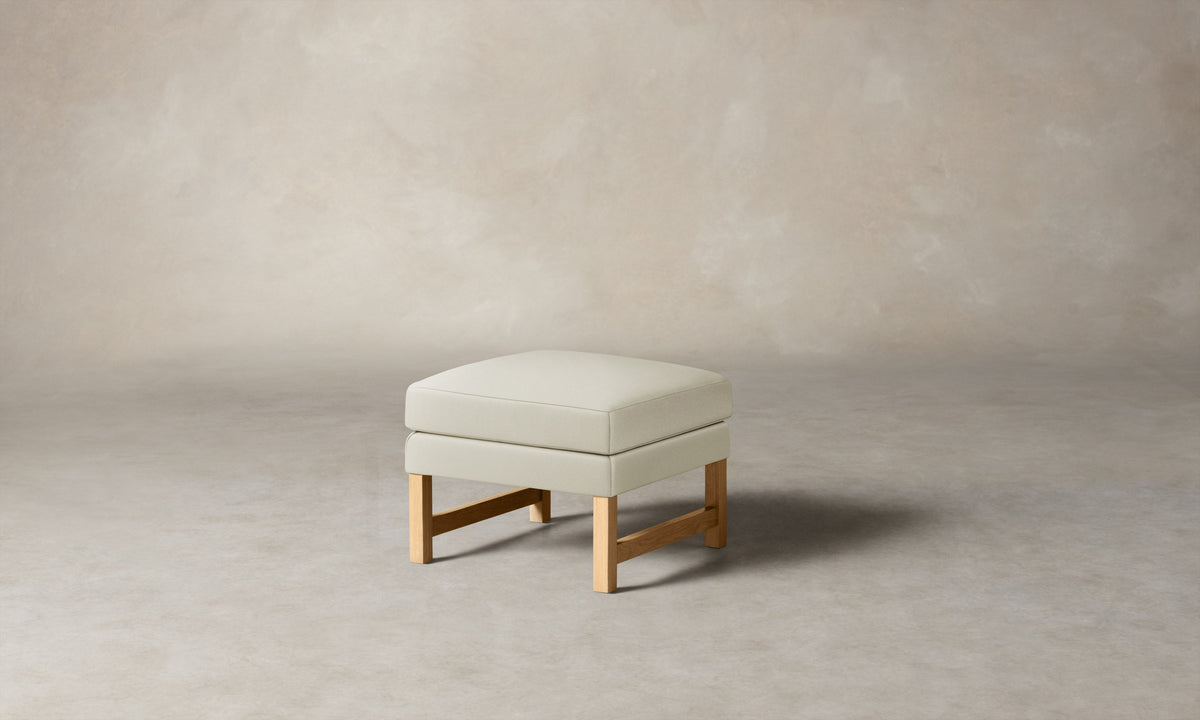 The Kaye Ottoman - Pebbled Leather Swan