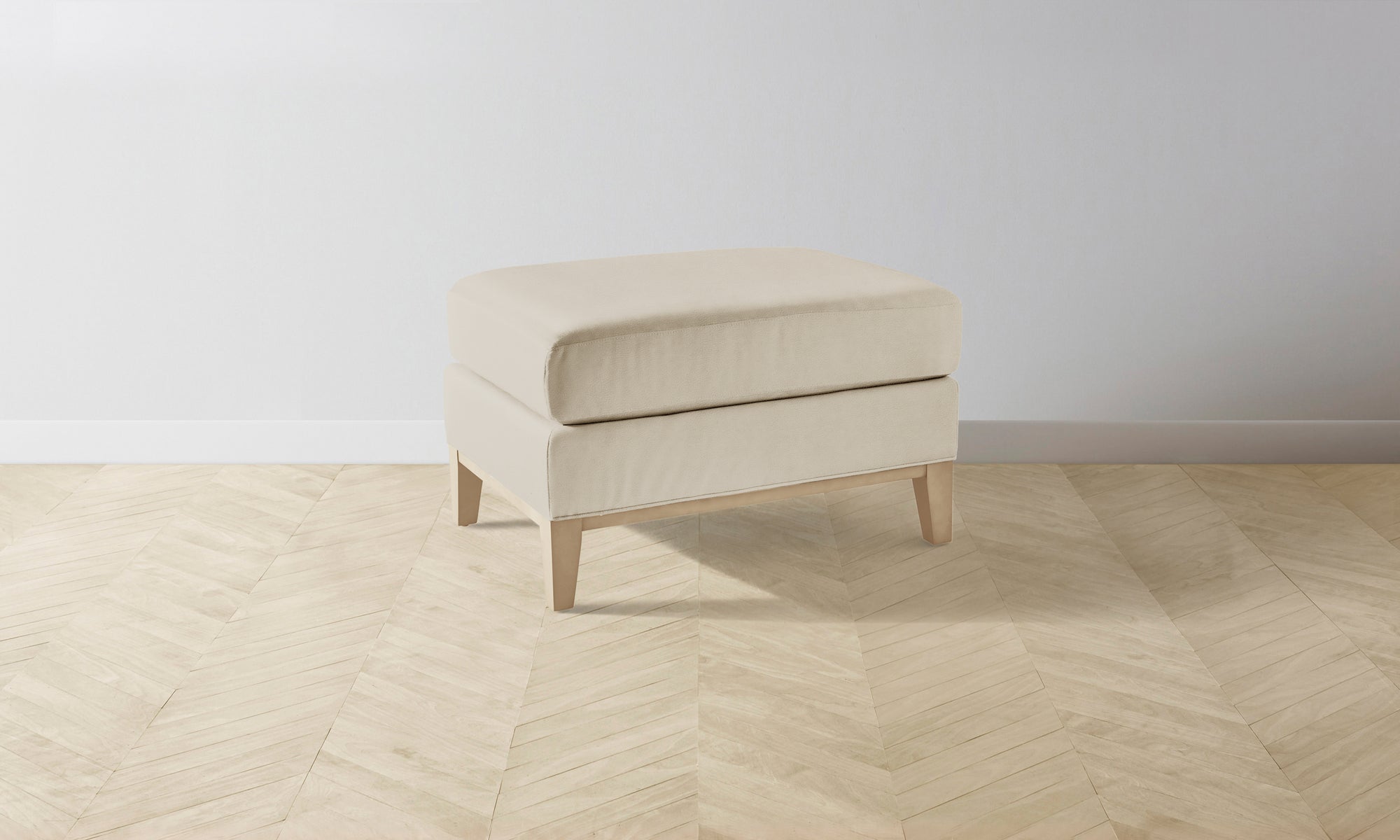 The Ludlow Ottoman - Pebbled Leather Stone