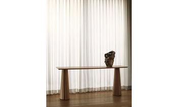 bank console table in light oak wood in a modern living room