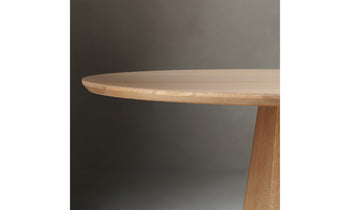 bank oval wood dining table in natural oak, close up on table top