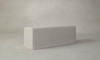 beacon slipcovered dining bench in off-white inen, angle view