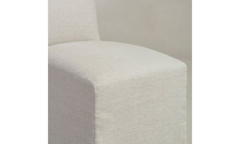 beacon slipcovered dining chair in white linen, close up view