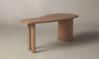 beekman wood desk in pecan oak with asymmetrical tabletop - side view