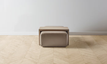 bowery ottoman with wood tray in beige stone leather in ash wood - view from the side