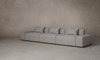 breuer modular sofa in grey linen with throw pillows and 3 seats - angle view