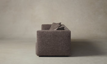 breuer sofa in brown chambray linen with throw pillows - side view