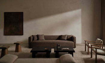 breuer sofa in brown chambray linen with throw pillows in a modern design living room