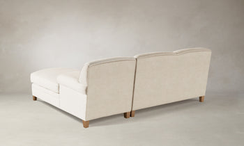 carmine rolled arms sectional sofa with chaise in white linen - back view