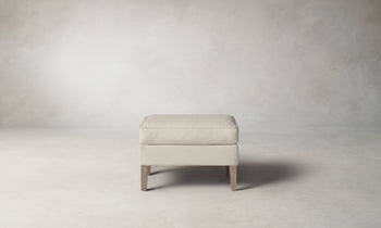 chrystie white nubuck leather ottoman with wooden legs