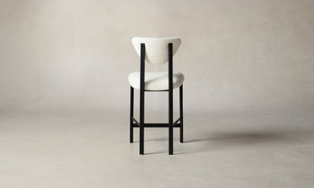 cooper counter stool in white boucle with black metal frame, back view