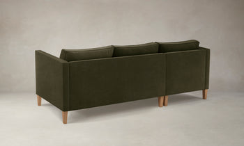 crosby olive green velvet sectional sofa with chaise with wooden legs - back view