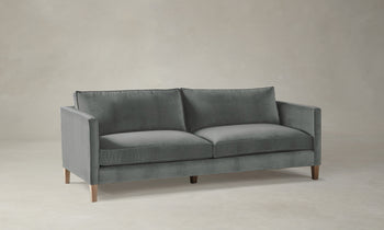 crosby sofa in velvet gray with wooden legs