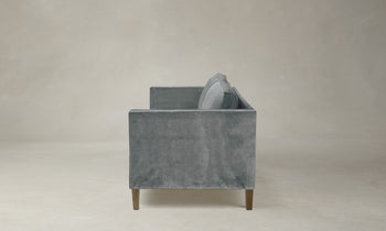 crosby sofa in velvet grey with wooden legs - side view