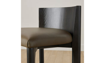 delancey barstool in black ash wood with truffle green leather seat, close up