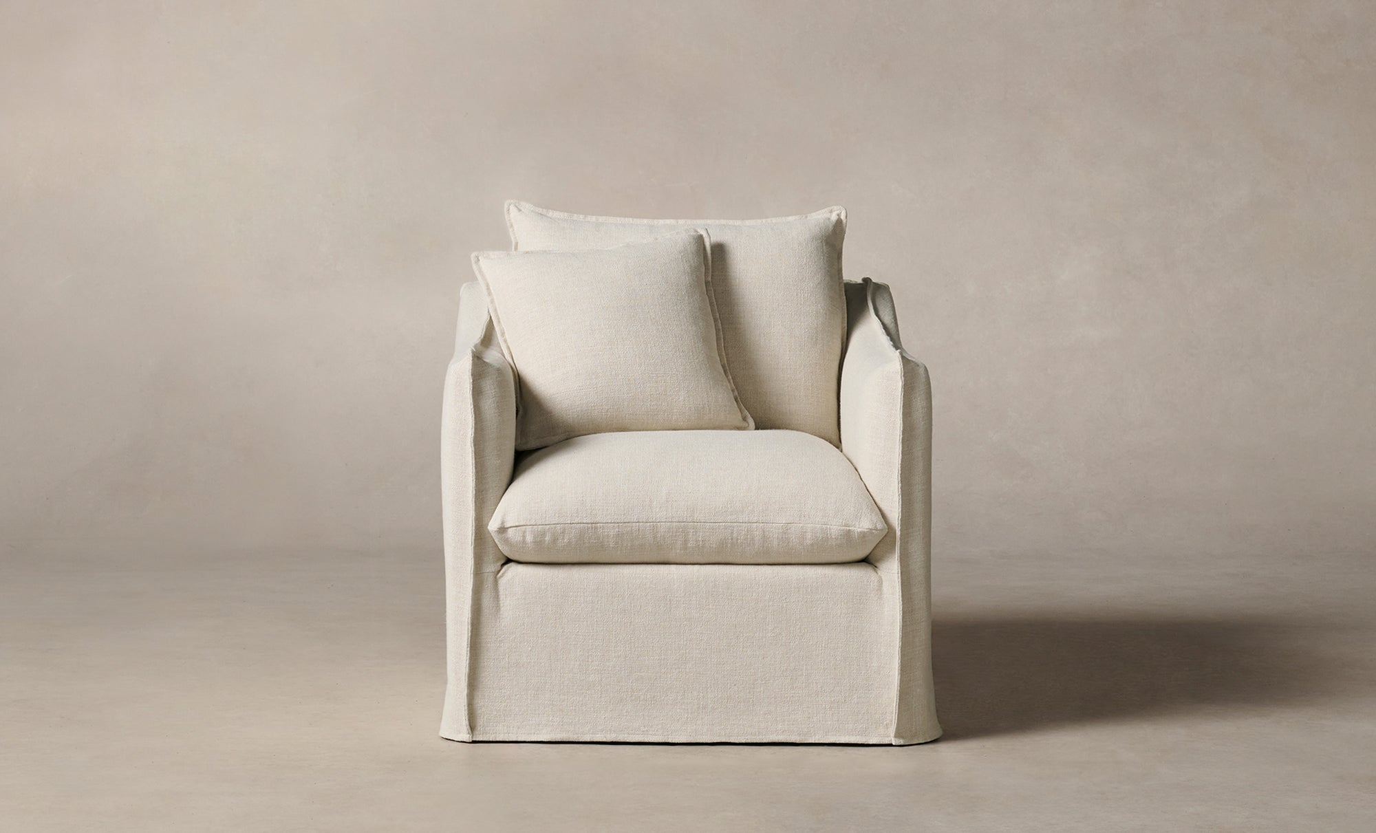 dune white linen upholstered accent chair with cushions