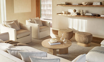 dune white linen upholstered accent chair with cushions in a modern living room