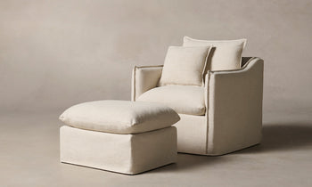 dune white linen swivel accent chair with cushions and an ottoman