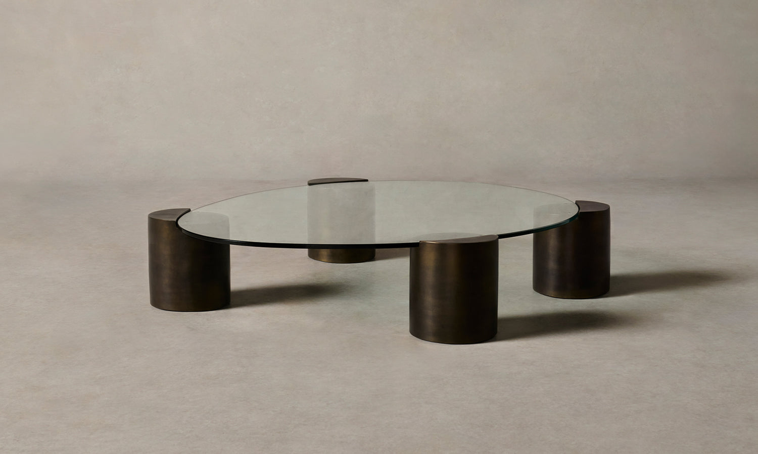 ella glass coffee table with bronze legs