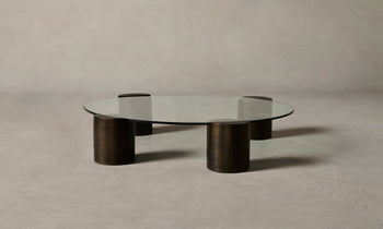 ella glass coffee table with bronze legs - side view