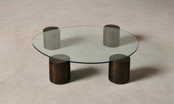 ella glass coffee table with bronze legs and unique shape - view from top