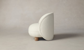 laight round white boucle accent chair with wooden legs - side view