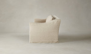 leonard sofa in beige linen with cushions - side view