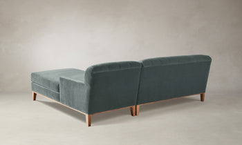 ludlow tufted chaise sectional sofa in seafoam velvet with wooden base