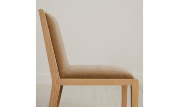 madison dining chair in brown ash wood  with beige mohair fabric, side view