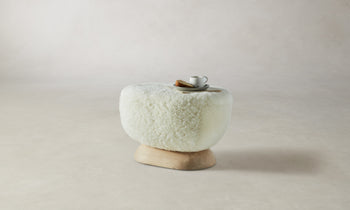 mott stool with wood base and white shearling fabric