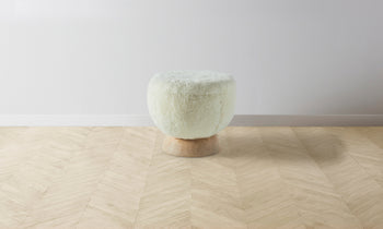 mott stool with wood base and white shearling fabric - side view