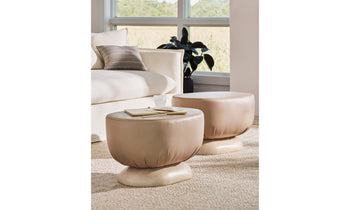 mott stool with wood base and light brown leather in modern living room