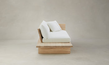 muir sofa with built in table in white chenille fabric and wooden frame - side view