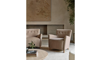 perry accent chair in beige leather with wooden legs - in a modern living room