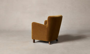 perry accent chair in golden brown mohair fabric and wooden legs - back view