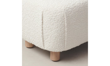 perry white boucle ottoman with maple wood legs - close up