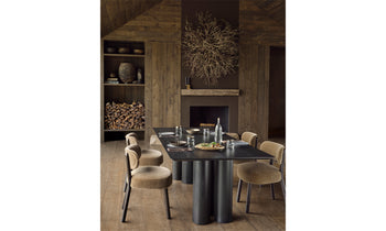 reade wood dining table in balck ash wood in a modern cabin design dining room